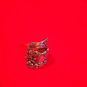 Intricate Silver Wrap-Around Ring with Feather Design